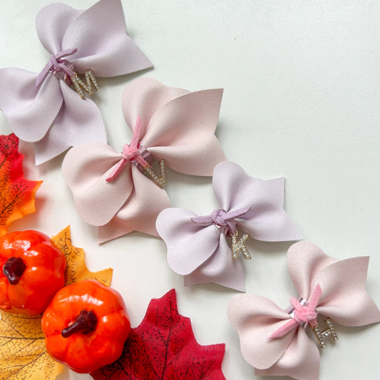 Initial charm bows